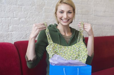 Woman opening gift