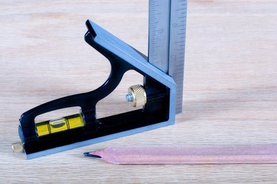Use the carpenter’s square as a guide