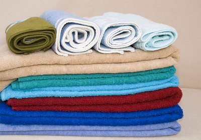 Wet a towel in warm water