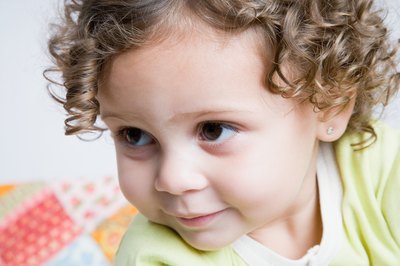 Baby with quilt