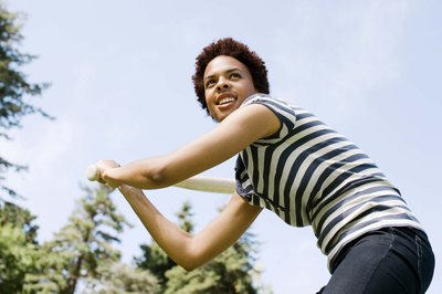 Young woman playing baseball