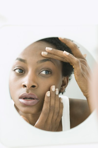 Checking eyes in the mirror