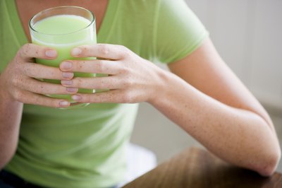 Woman with Spirulina beverage