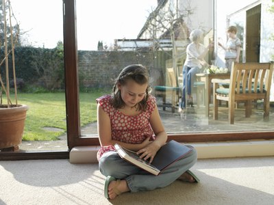 Girl looking at photo album