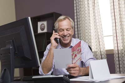 Man reading birthday card