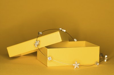 Yellow gift box and gift.