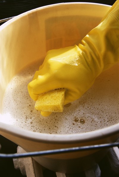 Wash all cabinets with warm soapy water.