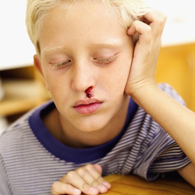 Boy with a nose bleed