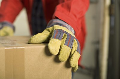 man wearing gloves in wareheouse
