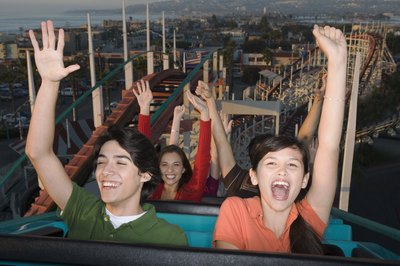 Sit as close to the front of the ride as possible.