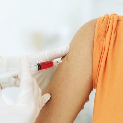 A woman gets her blood drawn.