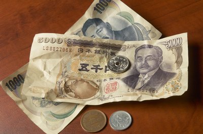 Coins and paper Yen from Japan.