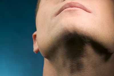 man doing neck stretching