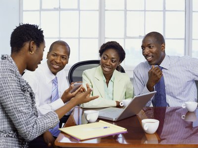 Men and women working together.