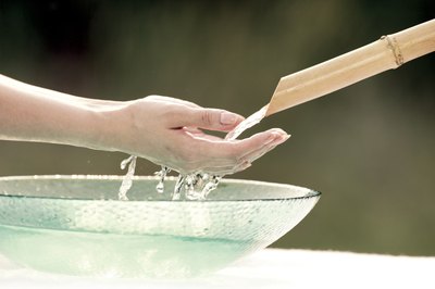 woman rinsing hands
