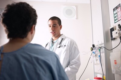 A patient and doctor discuss medical treatment.