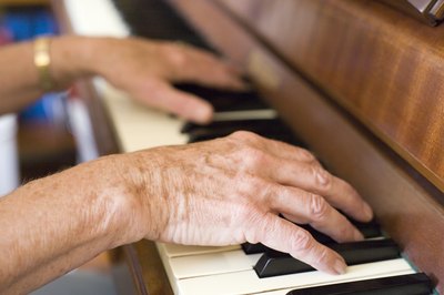 Hands on a piano