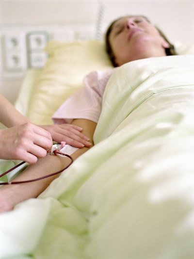 Woman gets an IV inserted