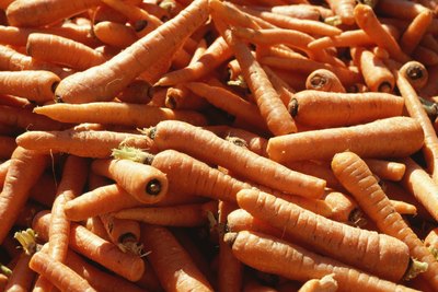 Blood type B friendly carrots for sale at a market.