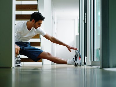Man stretching legs