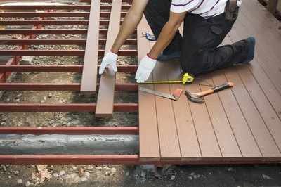 Worker building a porch.