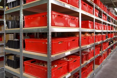 Storage room with shelves and red boxes