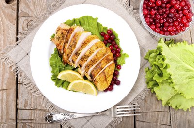 Cooked chicken breast with cranberries and lettuce
