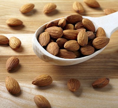 Small spoonful of raw almonds.
