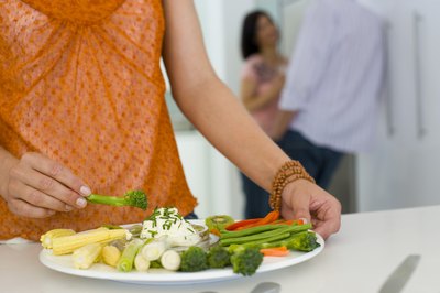 To lose 15 pounds in one month, you must only eat 1,200 to 1,500 calories per day.