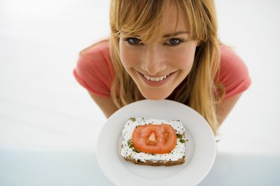 woman with plate of toast