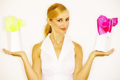 Woman with 2 gift bags.
