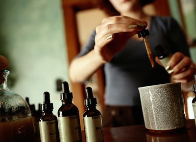 200 to 600 milligrams taken daily in a pill or liquid extract form.