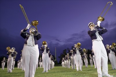 Highschool marching band on football field