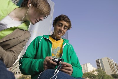 Teens using mp3 player
