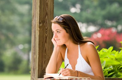 woman writing down list