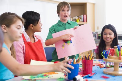 Create decorative posters that are based on positive values.