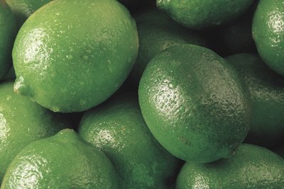 Fresh limes for sale at a market.