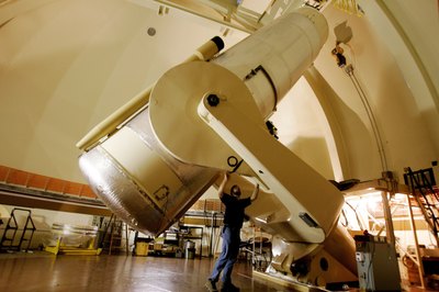 A Oschin 48 inch telescope being readied