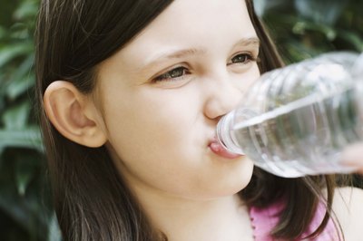 Someone who ingests a great deal of fluoridated water may be at risk of developing thyroid problems, as well experience tooth decay.