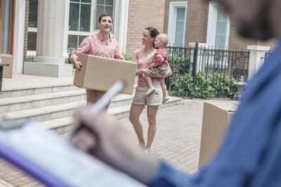 Family prepairing to load boxes