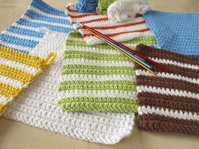 Close-up of several wool pot holders.