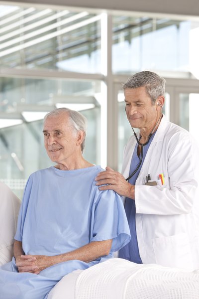 Doctor examining patient's lungs