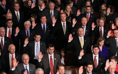 The U.S House of Representatives swears in at a convention.