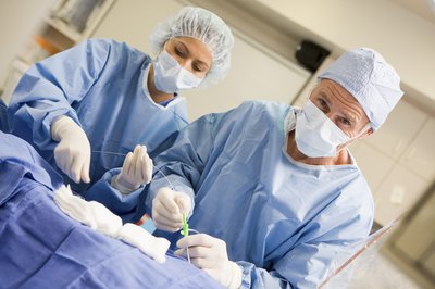 doctors performing heart surgery