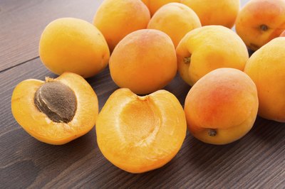 Fresh apricots on a wooden table