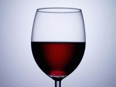 A glass of red wine.