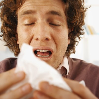 Man about to sneeze