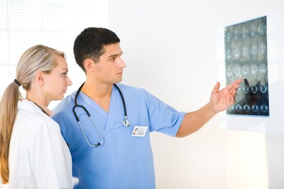 Doctors analyzing imagery
