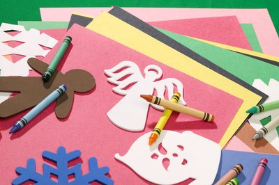 Use holiday stencils to create spray snow designs.