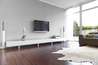 White living room with wood floor